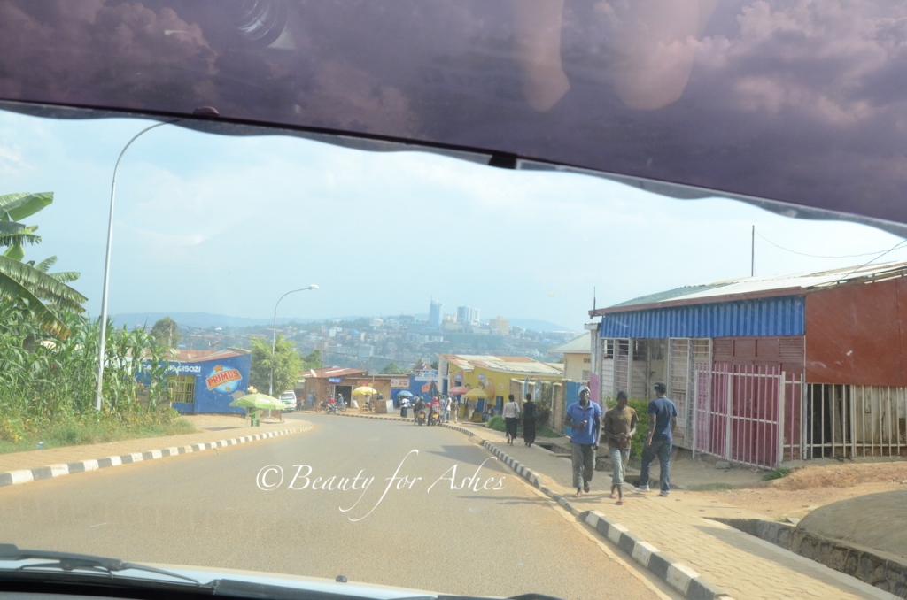 Downtown Kigali in the distance on the hilltop!
