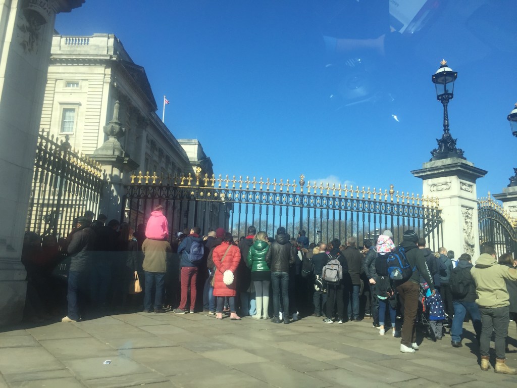 Citizens and tourists outside the Buckingham Palace waiting for Changing the Guards ceremony